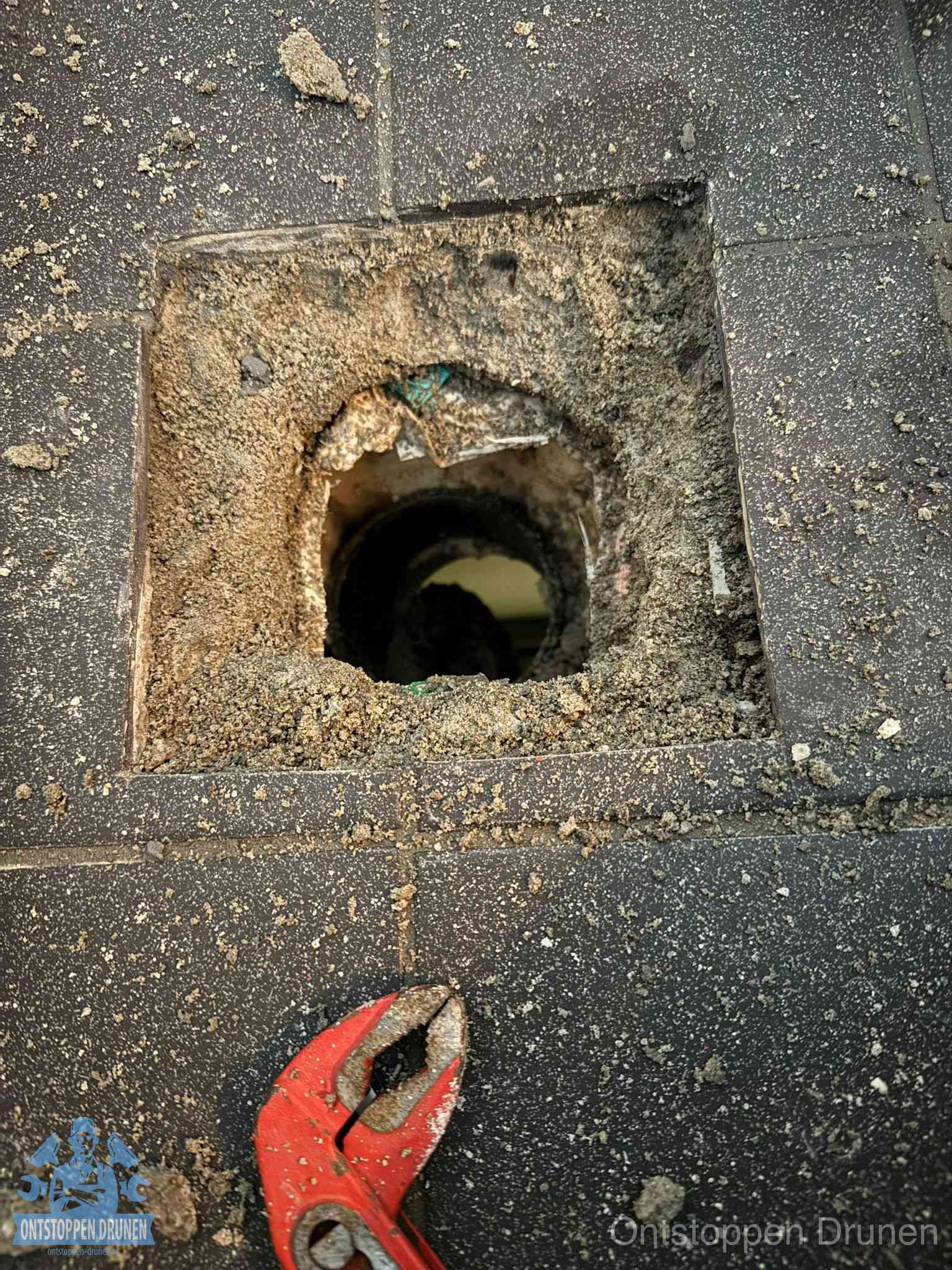 Rioolputje erfgrens eigendom in Drunen